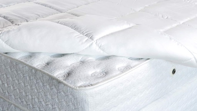 plain white mattress with layers